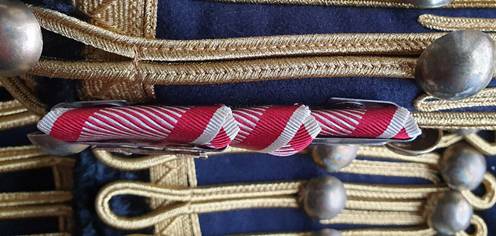 Ein Bild, das Textilfaser, gestreift, Im Haus enthält.
Automatisch generierte Beschreibung